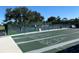 Recreation area featuring shuffleboard and pickleball courts, perfect for outdoor games and community fun at 634 Bird Bay E Dr # 103, Venice, FL 34285