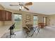 Bright kitchen features an adjacent dining area with great natural light and a view of the neighborhood at 6627 Marius Rd, North Port, FL 34287