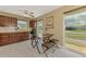 Inviting kitchen and dining area with modern appliances and a view of the outdoors at 6627 Marius Rd, North Port, FL 34287