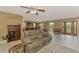 Open-concept living space with a breakfast bar and view of the entryway at 6627 Marius Rd, North Port, FL 34287