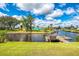 Waterfront property with private dock, boat, canal access, and charming neighborhood at 6627 Marius Rd, North Port, FL 34287