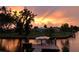 Waterfront property with private dock, canal access, and tranquil sunset views at 6627 Marius Rd, North Port, FL 34287