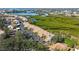 A beautiful aerial view of condos nestled amongst mangroves and waterways at 1106 Bird Bay Way # 316, Venice, FL 34285
