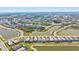 Vast aerial vista reveals a community with homes nestled between waterways, offering stunning views and waterfront access at 14724 Ponce De Leon Trl, Port Charlotte, FL 33981