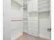 Organized walk-in closet with adjustable shelving and ample storage space at 14724 Ponce De Leon Trl, Port Charlotte, FL 33981