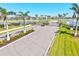 The gated community entrance is marked by stately pillars and lush landscaping, creating an inviting and secure environment at 14724 Ponce De Leon Trl, Port Charlotte, FL 33981