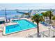 Bright and inviting swimming pool with clear blue water, offering a refreshing escape on a sunny day at 14724 Ponce De Leon Trl, Port Charlotte, FL 33981