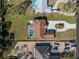 Aerial view of a home with a private pool and large backyard at 1611 Thomas St, Englewood, FL 34223