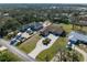 Gorgeous property with beautiful circular driveway and lush landscape at 1611 Thomas St, Englewood, FL 34223