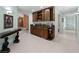 Entertaining bar featuring plenty of liquor storage and wine rack at 1611 Thomas St, Englewood, FL 34223