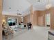 Spacious open-concept living space provides a seamless flow to the pool and the kitchen at 1611 Thomas St, Englewood, FL 34223