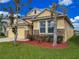 Charming single-story home boasts a well-manicured lawn and a two-car garage at 1724 Bonita Bluff Ct, Ruskin, FL 33570