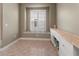 Cozy kitchen nook with window seating and custom cabinets, perfect for enjoying a quiet meal at 1724 Bonita Bluff Ct, Ruskin, FL 33570