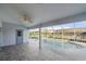 Screened-in patio with access to a sparkling pool, creating a relaxing outdoor living space at 5891 Madison Rd, Venice, FL 34293