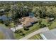 Expansive residence boasts meticulous landscaping and a private pond at 1093 Laurel Woods Dr, Nokomis, FL 34275
