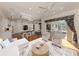 Spacious open-concept living area with kitchen, dining, and living spaces at 1093 Laurel Woods Dr, Nokomis, FL 34275