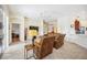 Inviting living room with comfortable seating, a large TV, and an open layout at 133 Treviso Ct, North Venice, FL 34275