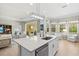 Cozy breakfast nook with pool views, custom window coverings, and seating at 19832 Bridgetown Loop, Venice, FL 34293