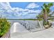 Scenic view of community dock overlooking the calm waters with a serene blue sky backdrop at 19832 Bridgetown Loop, Venice, FL 34293