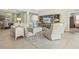 Stylish living room with a built-in entertainment center and tile floors at 19832 Bridgetown Loop, Venice, FL 34293
