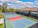 Enjoy a game of tennis in the sunshine on the community tennis court at 19832 Bridgetown Loop, Venice, FL 34293