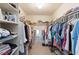 Well-organized walk-in closet with ample shelving and hanging space at 407 Rubens Dr, Nokomis, FL 34275