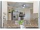 Updated kitchen featuring granite countertops and stainless steel appliances at 407 Rubens Dr, Nokomis, FL 34275