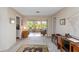 Bright room with desk and view to sunroom at 407 Rubens Dr, Nokomis, FL 34275