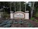 Stone sign for the Sawgrass community featuring manicured landscaping at 408 Otter Creek Dr, Venice, FL 34292