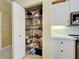 Kitchen featuring a pantry with shelves and storage space at 408 Otter Creek Dr, Venice, FL 34292
