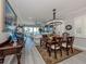 Open-concept dining area offering seamless flow to the living area and water views at 501 Tamiami N Trl # 502, Venice, FL 34285