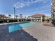 Enjoy the community pool with comfortable lounge seating and a gazebo at 501 Tamiami N Trl # 502, Venice, FL 34285