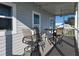 Covered porch with outdoor seating at 530 Walnut Cir, Venice, FL 34285