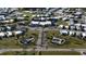 Expansive aerial view of a well-maintained community with fountains and lush landscaping at 5311 Palena Blvd, North Port, FL 34287