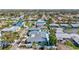 Charming neighborhood featuring a well-maintained home with a private pool and landscaped yard at 605 Cornwell On The Gulf, Venice, FL 34285