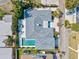 Stunning home with a refreshing private pool, elegant patio and a lovely landscaped garden at 605 Cornwell On The Gulf, Venice, FL 34285