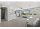 Spacious bedroom featuring bunk beds, large windows with water views, and comfortable seating at 605 Cornwell On The Gulf, Venice, FL 34285