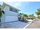 Two-car garage and well-maintained exterior of this lovely coastal residence at 605 Cornwell On The Gulf, Venice, FL 34285