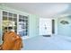 Welcoming front entrance with double doors and a cozy seating area at 605 Cornwell On The Gulf, Venice, FL 34285