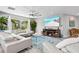 Comfortable living room featuring modern decor, plush seating, and serene color palette at 605 Cornwell On The Gulf, Venice, FL 34285