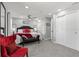 Spacious main bedroom with ceiling fan, gray carpet, and closet at 605 Cornwell On The Gulf, Venice, FL 34285