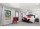 Bright main bedroom with gray carpet, gray walls, and white trim at 605 Cornwell On The Gulf, Venice, FL 34285