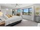 Bright main bedroom featuring large windows and neutral tone at 605 Cornwell On The Gulf, Venice, FL 34285