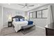 Neutral tone main bedroom featuring gray carpet and black and white decor at 605 Cornwell On The Gulf, Venice, FL 34285