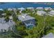 Beautiful aerial view of the home and neighborhood with water views at 746 Eagle Point Dr, Venice, FL 34285