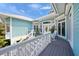 Beautiful deck featuring white railings, outdoor seating and water views, perfect for relaxation at 746 Eagle Point Dr, Venice, FL 34285