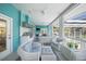 Inviting outdoor patio with comfortable seating, a grill, and a relaxing atmosphere at 746 Eagle Point Dr, Venice, FL 34285