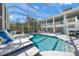 Stunning pool with spa and spacious deck, perfect for outdoor entertaining and relaxation at 746 Eagle Point Dr, Venice, FL 34285