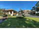 Well-maintained community clubhouse with attractive landscaping at 748 White Pine Tree Rd # 208, Venice, FL 34285