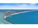 Expansive aerial view showcasing the beautiful coastline with pristine beaches meeting the clear blue ocean waters at 888 Guild Dr, Venice, FL 34285